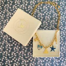 Charger l'image dans la galerie, Collier Laëtitia triskell breton étoile de mer coeur bleu acier inox doré